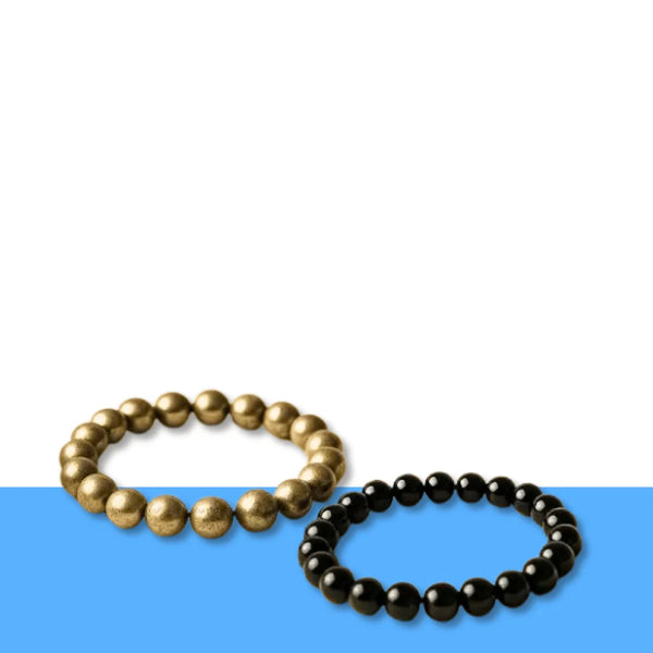 Black and gold bead crystal bracelets displayed on a white and blue background