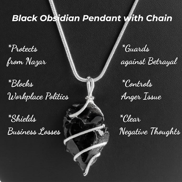Black obsidian arrowhead crystal pendant with chain displayed on a black background
