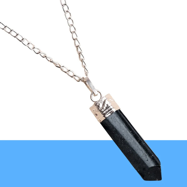 Black Tourmaline pencil-cut pendant displayed on a white background with a soft blue color 