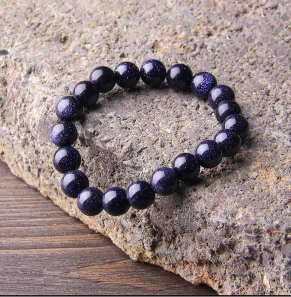 The Blue Sunstone bracelet with a focus on its vibrant color and unique texture.
