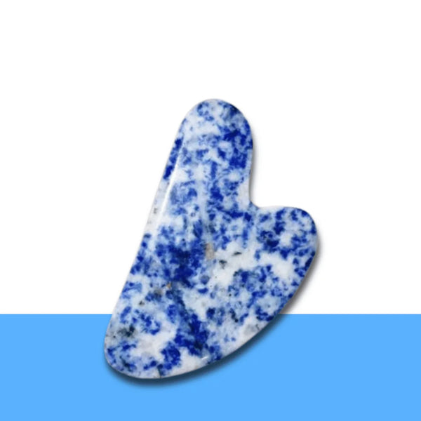 Blue Sodalite Gua Sha facial stone shown clearly, promoting relaxation, focus and smooth expression.