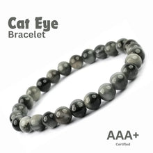 Load image into Gallery viewer, Cat Eye crystal bracelet featuring polished round beads.
