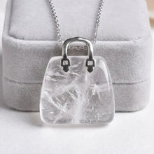 Load image into Gallery viewer, Clear Quartz Mini Handbag Pendant – Symbol of Energy, Amplification, and Clarity – Perfect for Daily Wear - Side View | Natural Sphatik, Seven Chakra Crystal Ring for Chakra Balance &amp; Energy Alignment
