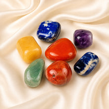 Load image into Gallery viewer, 7 Chakra Tumble Tumble Set displayed fully on white silk cloth to show its natural colour, shape and finish
