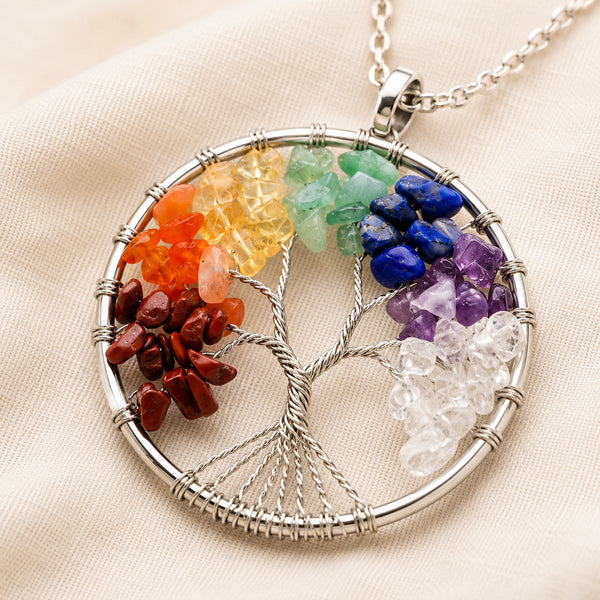 Close-up of authentic natural 7 Chakra showing crystal texture, colour and craftsmanship – 7 chakra tree of life pendant chain healing crystal for