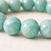 Close-up of authentic natural Amazonite showing crystal texture, colour and craftsmanship