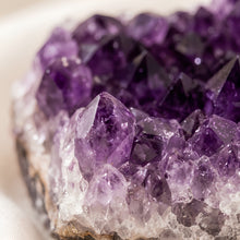 Load image into Gallery viewer, Close-up of authentic natural Amethyst showing crystal texture, colour and craftsmanship – amethyst raw stone symbol of serenity wisdom and spiritual protection
