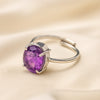 Amethyst Adjustable Ring displayed fully on white silk cloth to show its natural colour, shape and finish