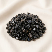 Load image into Gallery viewer, Black Agate Chips displayed fully on white silk cloth to show its natural colour, shape and finish
