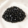 Black Obsidian Chips displayed fully on white silk cloth to show its natural colour, shape and finish