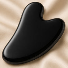 Load image into Gallery viewer, Close-up of authentic natural Black Obsidian showing crystal texture, colour and craftsmanship – black obsidian gua sha symbol of protection grounding and truth
