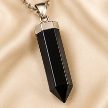 Load image into Gallery viewer, Close-up of authentic natural Black Obsidian showing crystal texture, colour and craftsmanship – black obsidian pencil pendant symbol of protection grounding
