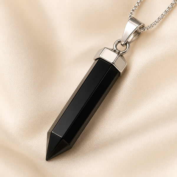 Close-up of authentic natural Black Onyx showing crystal texture, colour and craftsmanship – black onyx pencil pendant symbol of strength stamina and discipline
