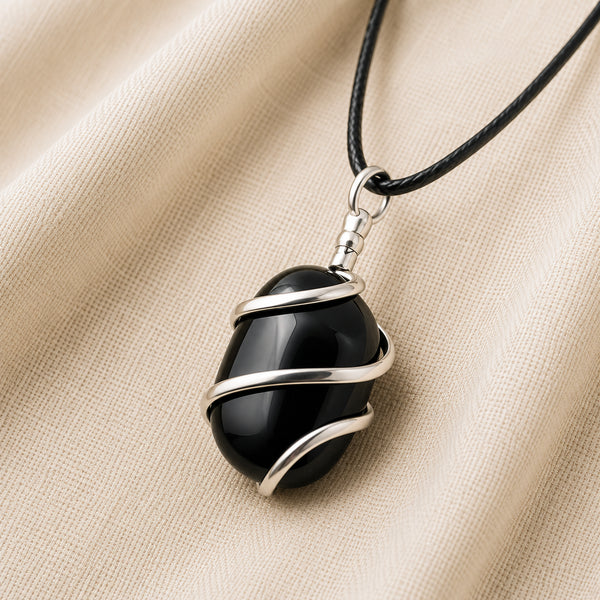 Close-up of authentic natural Black Onyx showing crystal texture, colour and craftsmanship – black onyx tumble pendant symbol of strength stamina and discipline