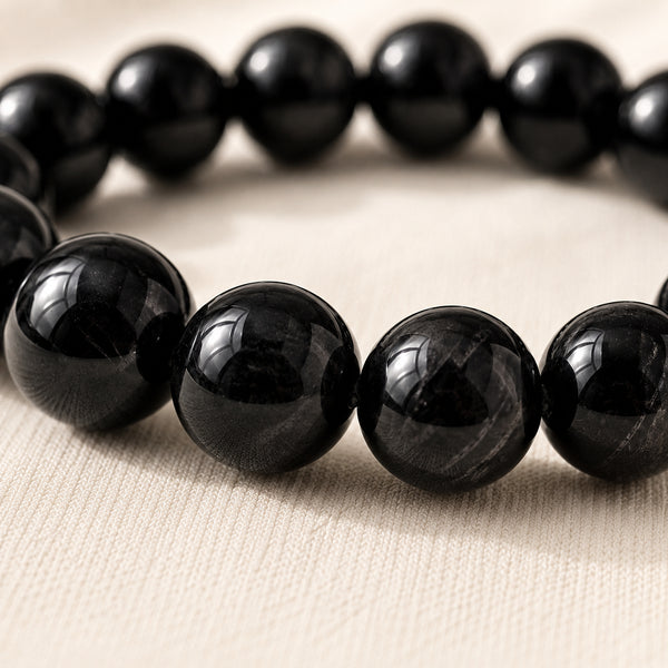 Close-up of authentic natural Black Tourmaline showing crystal texture, colour and craftsmanship
