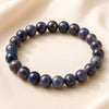 Blue Sunstone Bracelet displayed fully on white silk cloth to show its natural colour, shape and finish