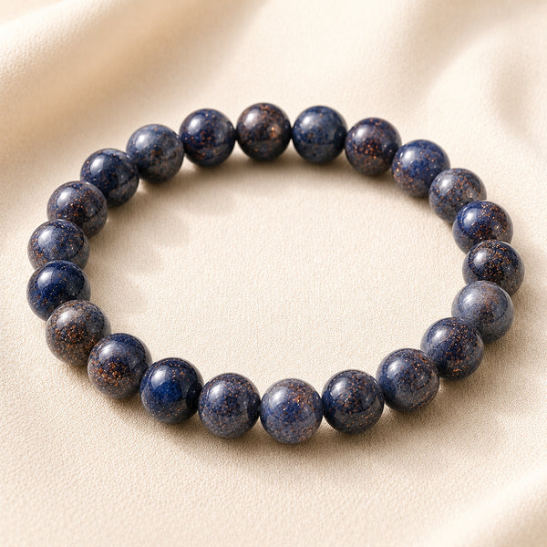 Blue Sunstone Bracelet displayed fully on white silk cloth to show its natural colour, shape and finish