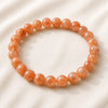 Carnelian Bracelet displayed fully on white silk cloth to show its natural colour, shape and finish