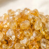 Close-up of authentic natural Citrine showing crystal texture, colour and craftsmanship – citrine chips stone symbol of abundance joy and manifestation perfect