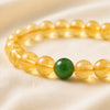 Close-up of authentic natural Green Jade and Citrine showing crystal texture, colour and craftsmanship