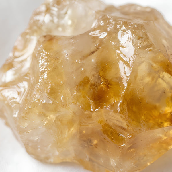 Close-up of authentic natural Citrine showing crystal texture, colour and craftsmanship – citrine raw stone symbol of abundance joy and manifestation perfect