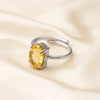 Citrine Adjustable Ring displayed fully on white silk cloth to show its natural colour, shape and finish