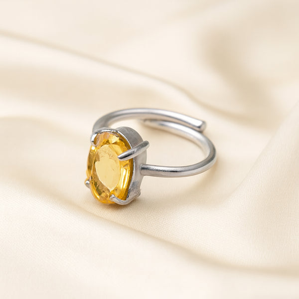 Citrine Adjustable Ring displayed fully on white silk cloth to show its natural colour, shape and finish