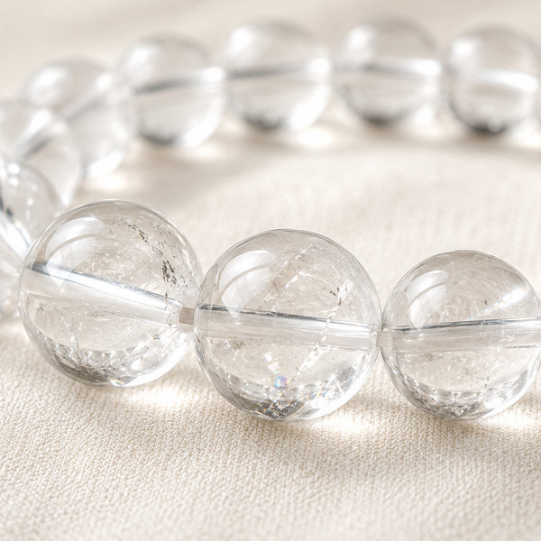 Close-up of authentic natural Clear Quartz and Sphatik showing crystal texture, colour and craftsmanship – clear quartz bracelet energy healing spiritual growth