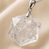 Close-up of authentic natural Clear Quartz showing crystal texture, colour and craftsmanship – clear quartz hexagon pendant symbol of energy amplification and