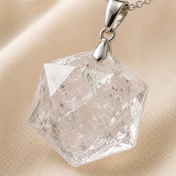 Close-up of authentic natural Clear Quartz showing crystal texture, colour and craftsmanship – clear quartz hexagon pendant symbol of energy amplification and
