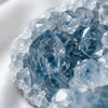Close-up of authentic natural Clear Quartz and Sphatik showing crystal texture, colour and craftsmanship – clear quartz raw stone symbol of power amplification