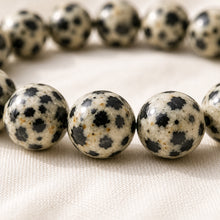 Load image into Gallery viewer, Close-up of authentic natural Dalmatian Jasper showing crystal texture, colour and craftsmanship
