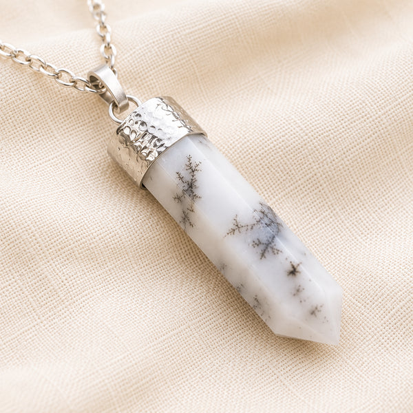 Close-up of authentic natural Dendrite showing crystal texture, colour and craftsmanship