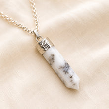 Load image into Gallery viewer, Dendrite Pencil Pendant displayed fully on white silk cloth to show its natural colour, shape and finish
