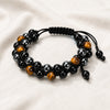 Dual Layer Triple Protection Bracelet displayed fully on white silk cloth to show its natural colour, shape and finish