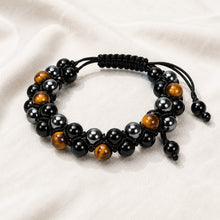 Load image into Gallery viewer, Dual Layer Triple Protection Bracelet displayed fully on white silk cloth to show its natural colour, shape and finish
