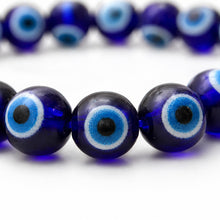 Load image into Gallery viewer, Close-up of authentic natural Evil Eye showing crystal texture, colour and craftsmanship – evil eye bracelet protection positivity good luck energy evashu
