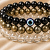 Close-up of authentic natural Clear Quartz, Evil Eye and Pyrite showing crystal texture, colour and craftsmanship