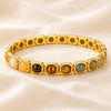 Golden Plated Money Magnet Bracelet displayed fully on white silk cloth to show its natural colour, shape and finish