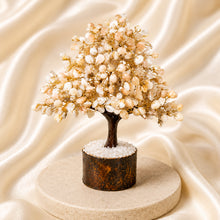 Load image into Gallery viewer, Gomati Chakra Crystal Tree displayed fully on white silk cloth to show its natural colour, shape and finish
