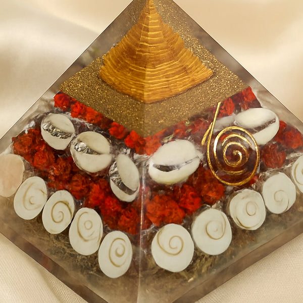 Close-up of authentic natural Gomti Chakra showing crystal texture, colour and craftsmanship – gomti chakra orgone pyramid protection positivity energy healing