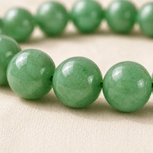 Load image into Gallery viewer, Close-up of authentic natural Green Aventurine showing crystal texture, colour and craftsmanship – green aventurine bracelet prosperity luck growth healing
