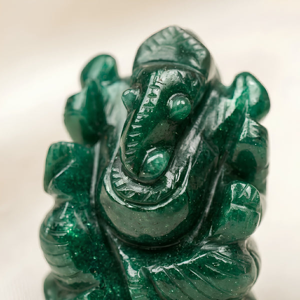 Close-up of authentic natural Green Aventurine showing crystal texture, colour and craftsmanship – green aventurine ganesh symbol of prosperity growth and good