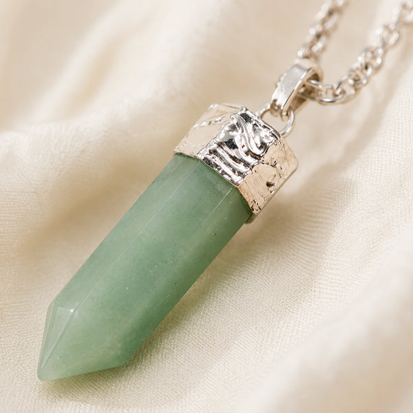 Close-up of authentic natural Green Aventurine showing crystal texture, colour and craftsmanship – green aventurine pencil pendant chain healing crystal for