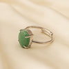 Green Aventurine Adjustable Ring displayed fully on white silk cloth to show its natural colour, shape and finish