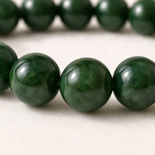 Load image into Gallery viewer, Close-up of authentic natural Green Jade showing crystal texture, colour and craftsmanship
