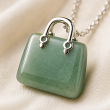 Load image into Gallery viewer, Close-up of authentic natural Green Jade showing crystal texture, colour and craftsmanship – green jade mini handbag pendant symbol of luck longevity and

