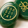Close-up of authentic natural Green Jade showing crystal texture, colour and craftsmanship – green jade zibu coin healing crystal for prosperity protection and