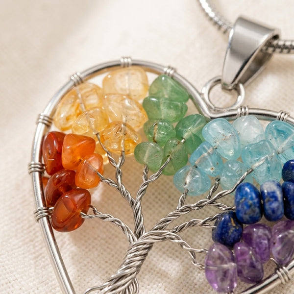 Close-up of authentic natural 7 Chakra showing crystal texture, colour and craftsmanship – heart shaped seven chakra tree of life pendant healing energy