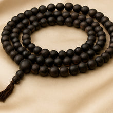 Load image into Gallery viewer, Close-up of authentic natural Karungali showing crystal texture, colour and craftsmanship
